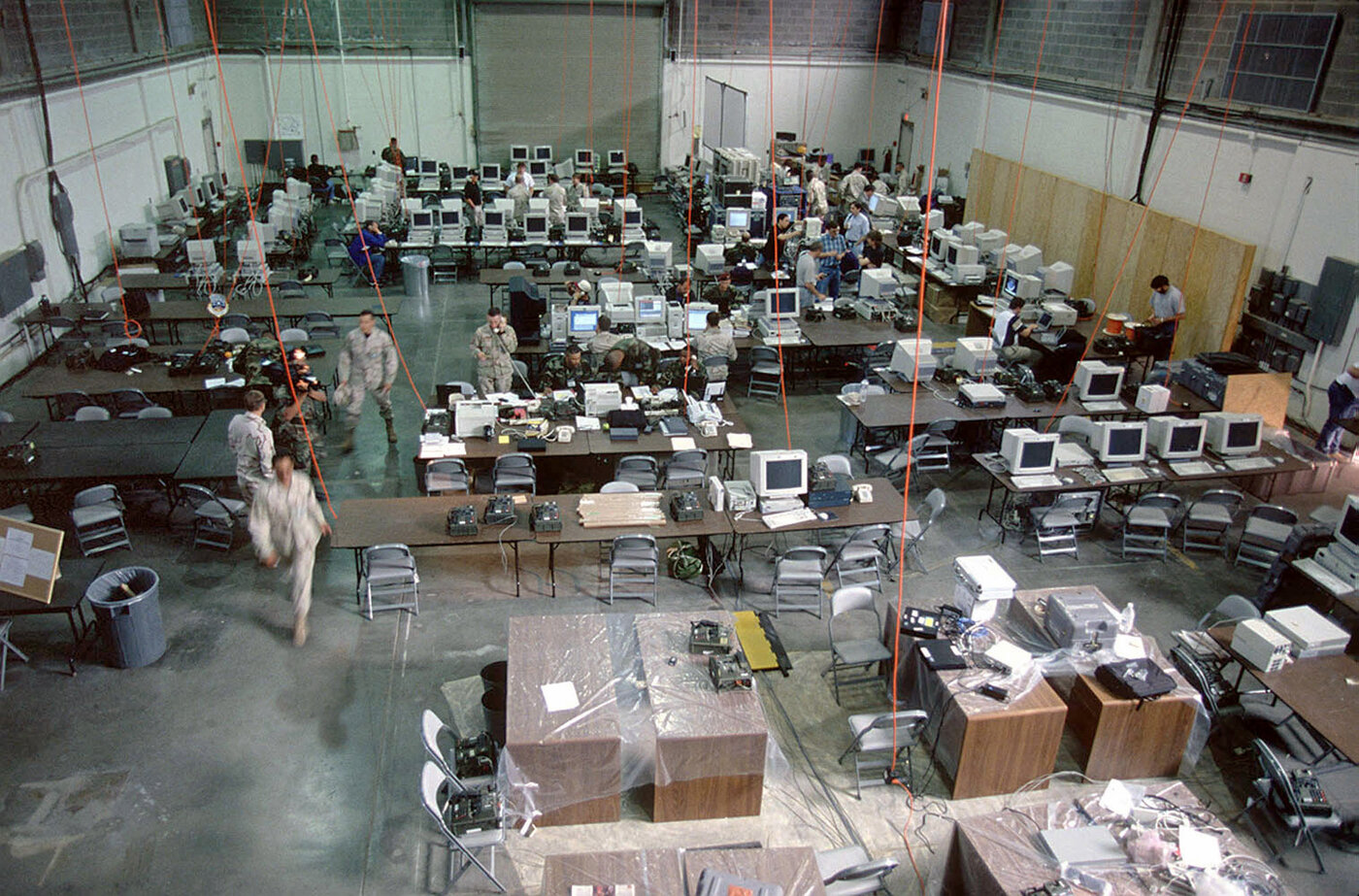 A Combined Air Operations Center with military personnel monitoring screens and coordinating air defense operations. Saudi Arabia operates a similar facility integrating radar data from across the Kingdom. Photo: US Air Force / Public Domain