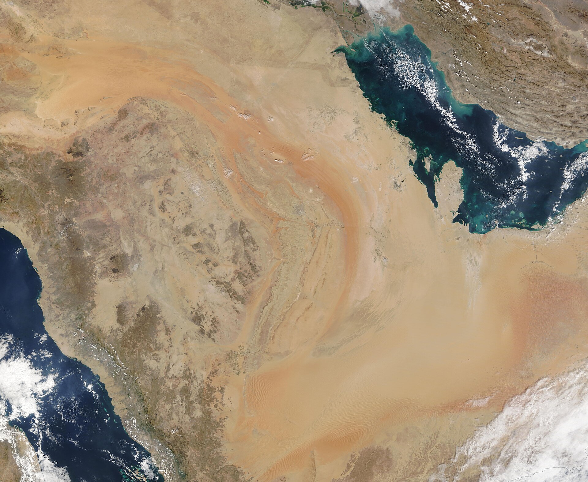 NASA satellite image of the Arabian Peninsula showing Saudi Arabia flanked by the Persian Gulf with the Strait of Hormuz to the northeast and the Red Sea with the Bab al-Mandab Strait to the southwest