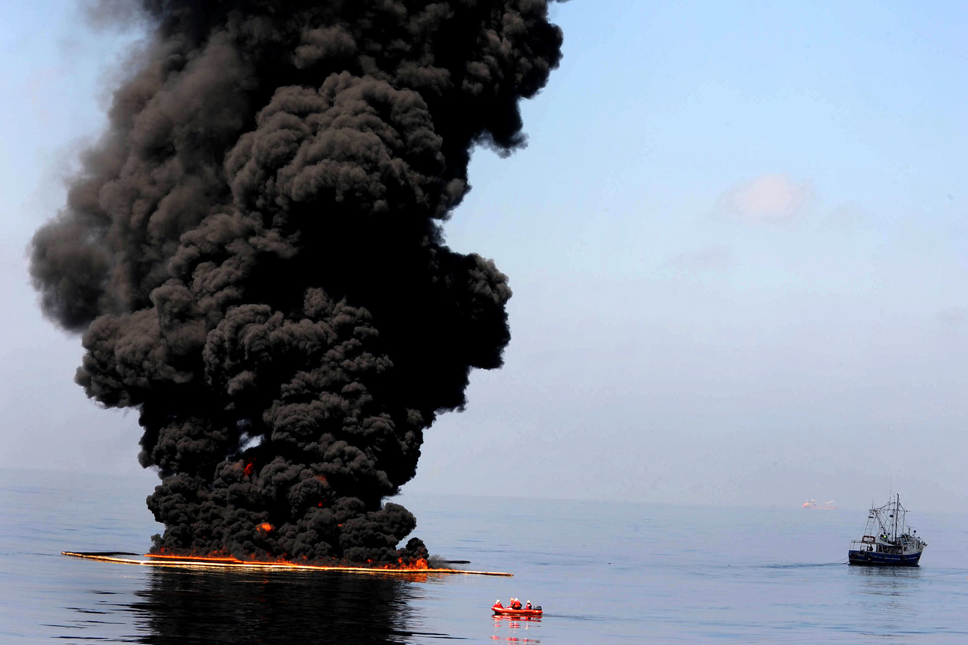 Thick black smoke and flames rising from a fuel fire on water in the Persian Gulf region. Photo: US Navy / Public Domain