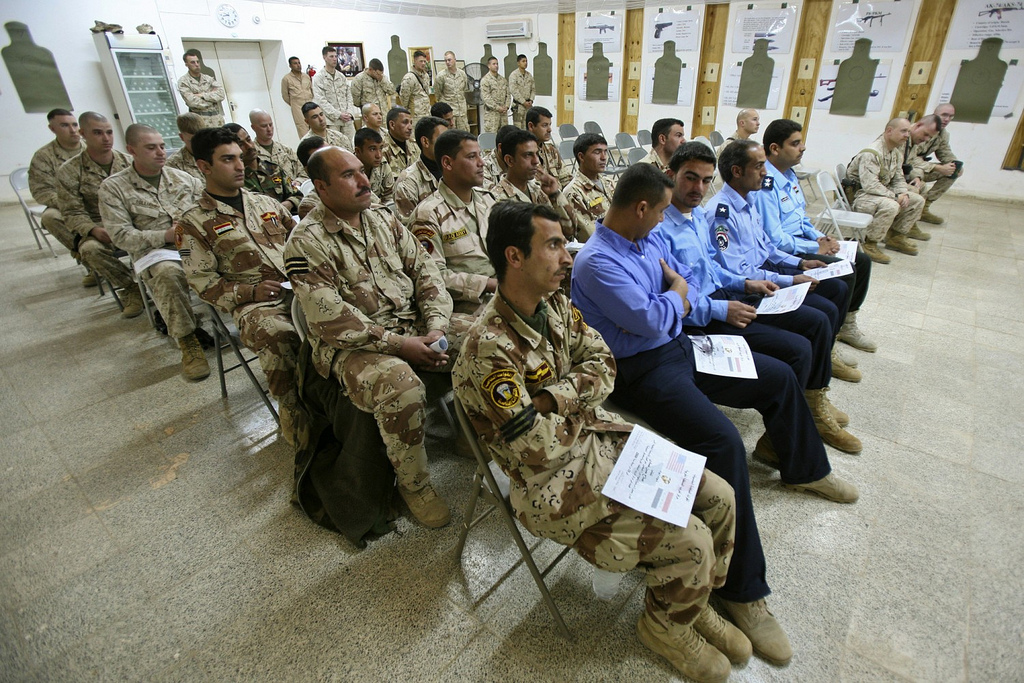 Iraqi and US military personnel at Camp Habbaniyah during a training session in Anbar Province. Photo: US Marines / Public Domain
