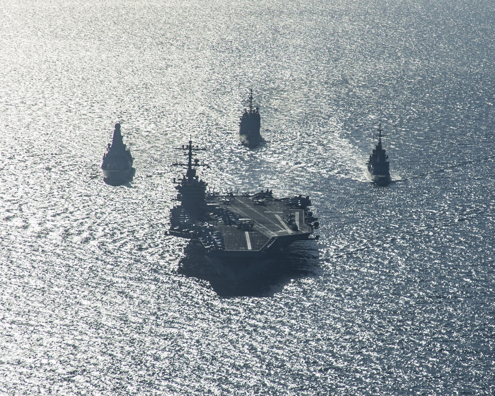 USS Carl Vinson carrier strike group with British, French and American warships in formation in the Arabian Gulf