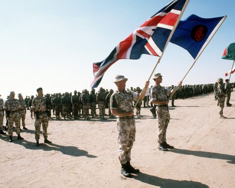Coalition troops from multiple nations with national flags gathered in Saudi Arabia during Operation Desert Storm, the last major military coalition on Saudi soil. Photo: US Department of Defense / Public Domain