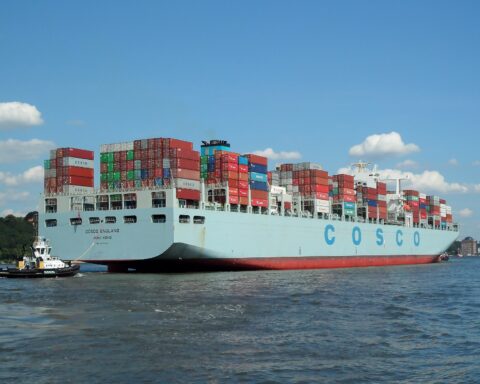 COSCO container ship transiting international waters, representing Chinese maritime trade dominance during the 2026 Strait of Hormuz crisis. Photo: Wikimedia Commons / CC BY-SA 3.0