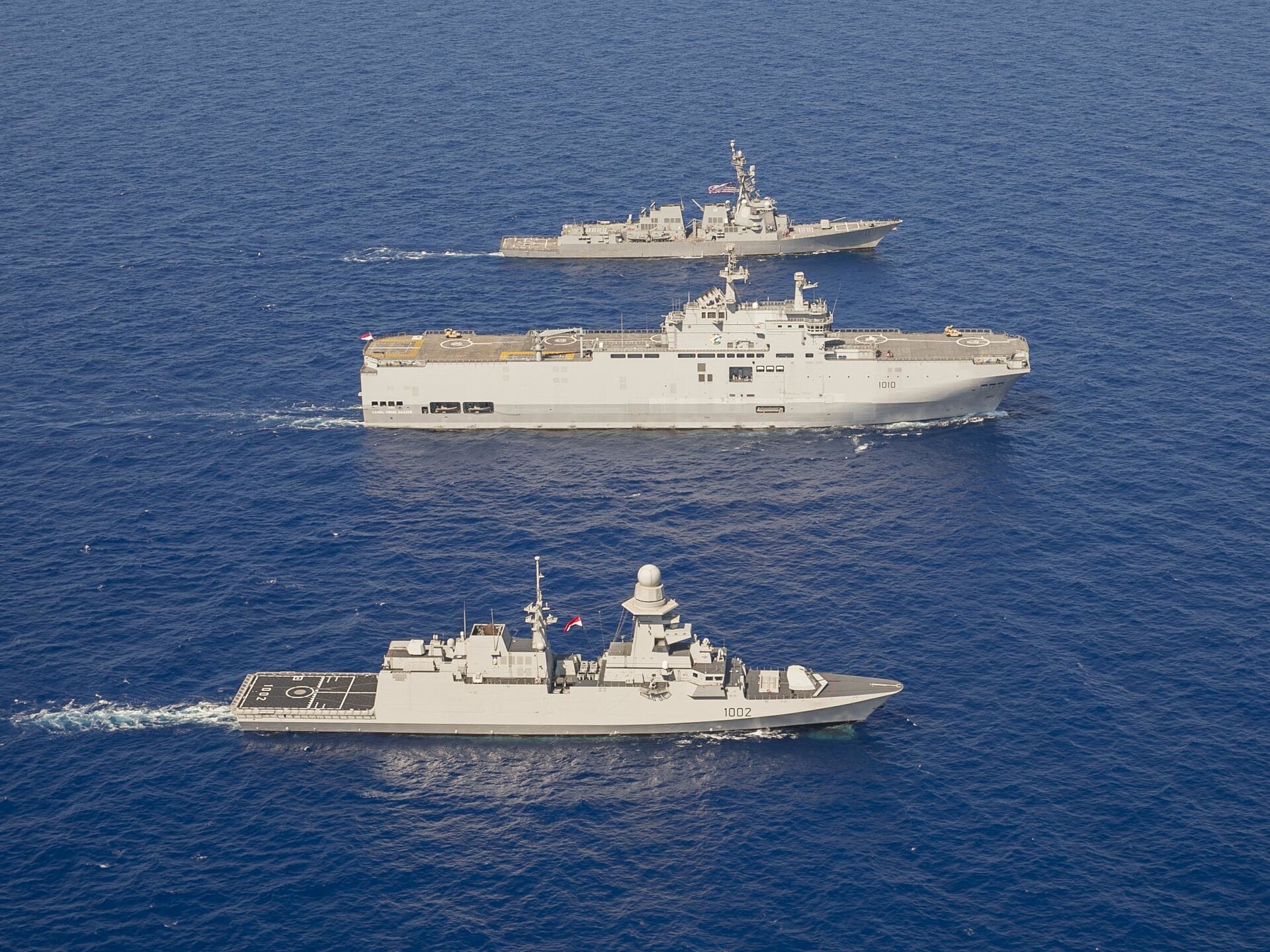 Egyptian Navy warships including the ENS Gamal Abdel Nasser Mistral-class carrier and FREMM frigate in formation in the Mediterranean Sea. Photo: US Navy / CC BY 2.0