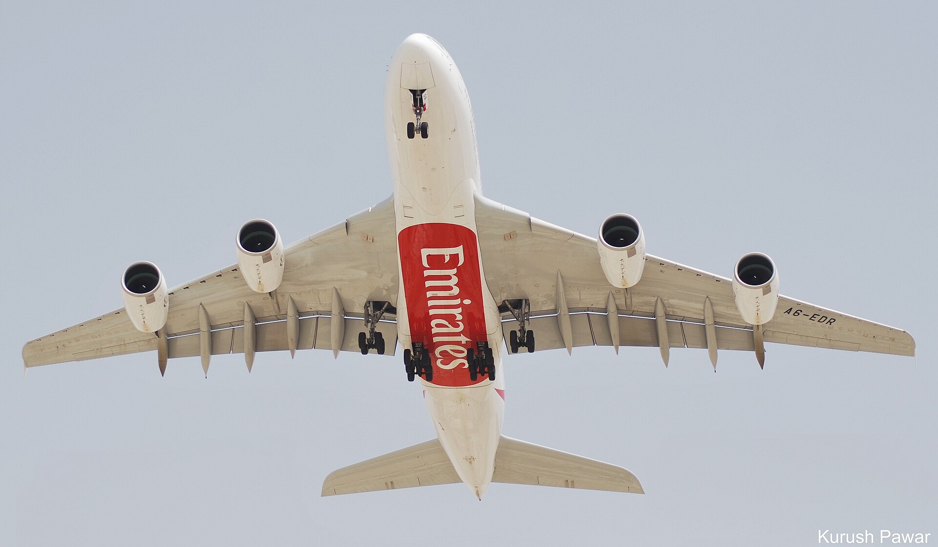 An Emirates Airbus A380 aircraft seen from below at Dubai International Airport, one of the Gulf hubs hit hardest by Iran war airspace closures