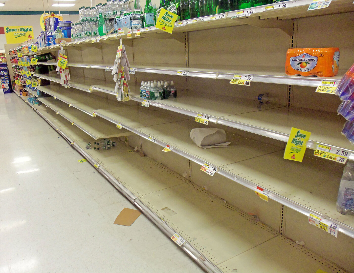 Empty supermarket shelves during a supply crisis, illustrating the food security vulnerability facing Gulf states dependent on imports through the Strait of Hormuz