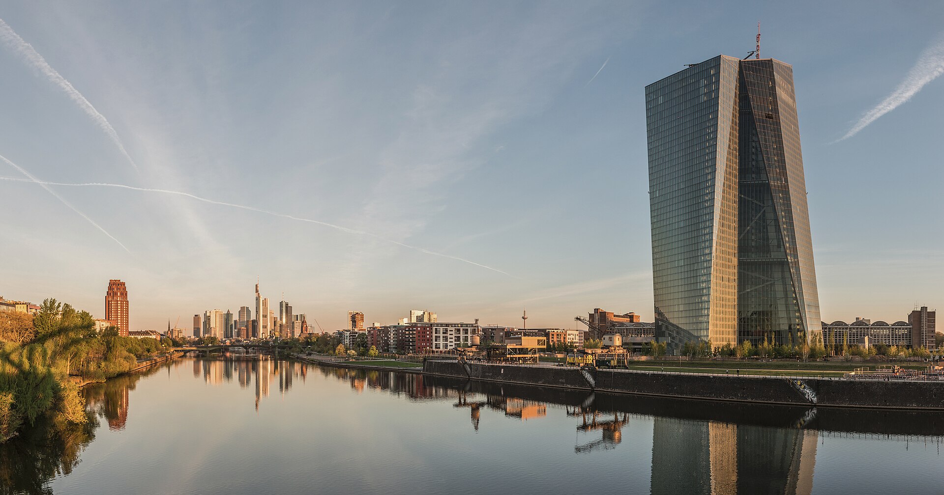The European Central Bank headquarters and Frankfurt skyline at dawn. The ECB faces renewed inflation pressure from the Iran war energy shock