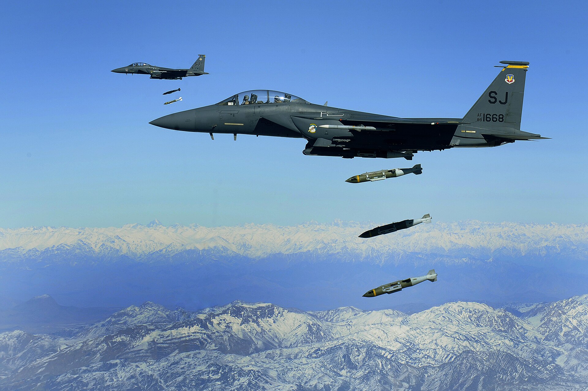 U.S. Air Force F-15E Strike Eagle aircraft dropping JDAM precision-guided munitions during Operation Epic Fury against Iran. Photo: U.S. Air Force / Public Domain