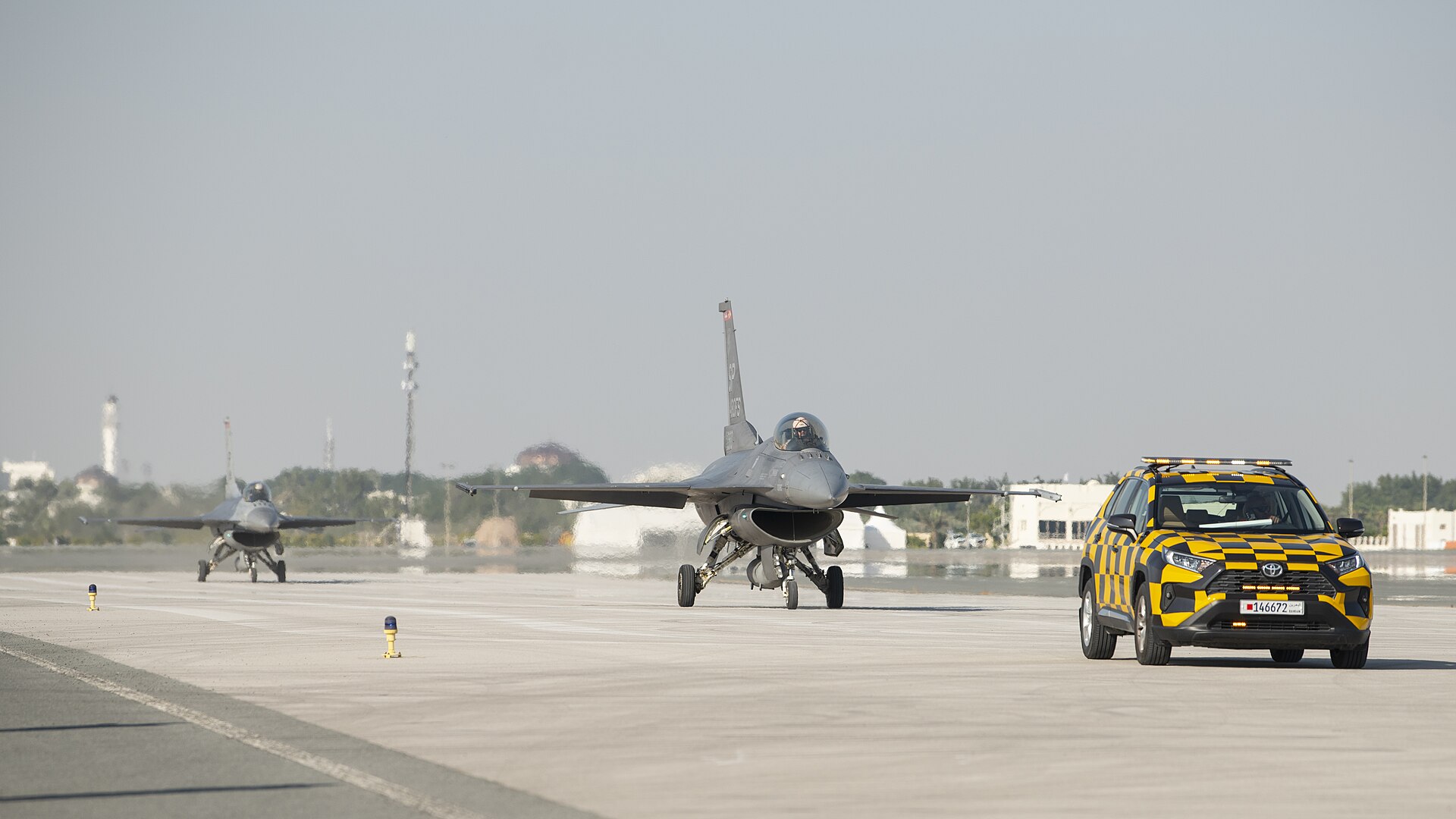 F-16 Fighting Falcons taxi at Sakhir Air Base in Bahrain during the 2024 Bahrain International Airshow