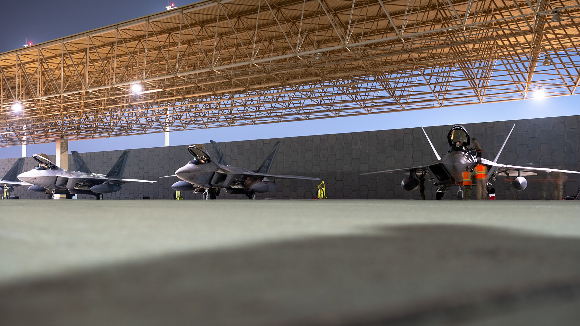 U.S. Air Force F-22 Raptors deployed to the CENTCOM area of responsibility at a Middle East air base. Photo: U.S. Air Force / Public Domain