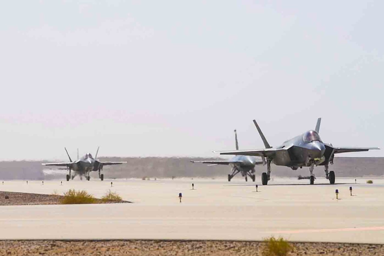 U.S. Air Force F-35A Lightning II and F-16C Fighting Falcon fighters taxi at Prince Sultan Air Base in Saudi Arabia. Photo: U.S. Air Force / Public Domain