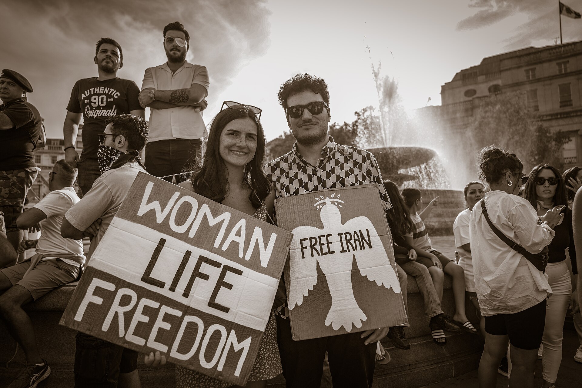 Demonstrators hold Woman Life Freedom and Free Iran signs at a solidarity protest in London. Photo: Wikimedia Commons / CC BY-SA 2.0