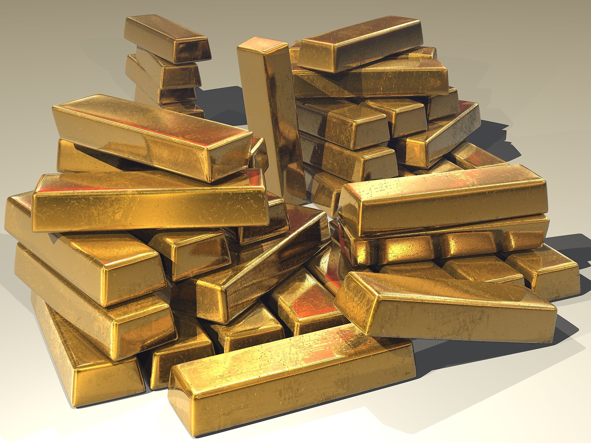 Stacked gold bullion bars representing the growing gold production from Saudi Arabia mining operations under Ma'aden. Photo: Wikimedia Commons / CC0