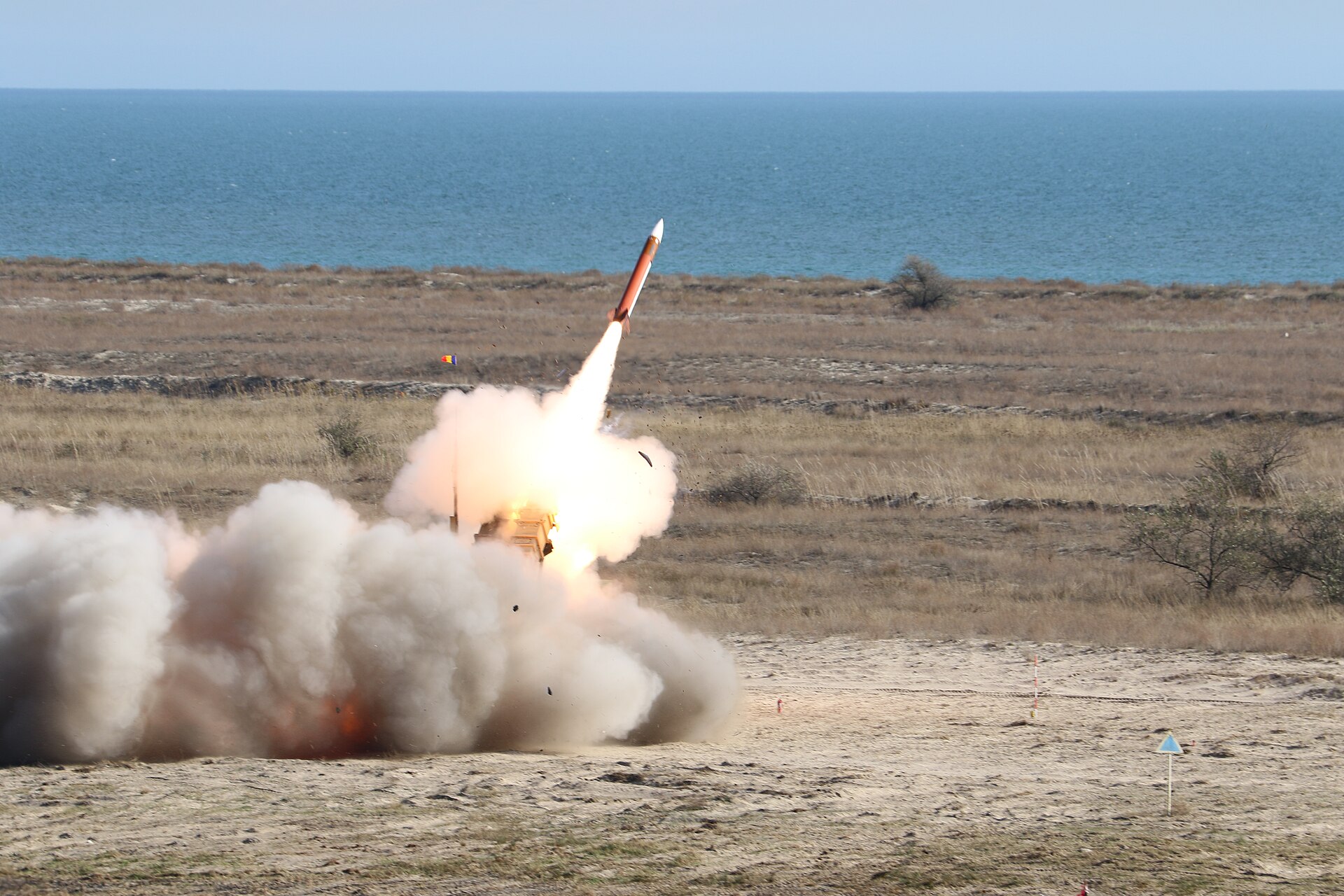 A Patriot missile interceptor launches from its mobile launcher during a live-fire exercise. Greek-operated Patriot systems intercepted Iranian ballistic missiles targeting Saudi Arabias Yanbu refinery on March 19 2026. Photo: US Army / Public Domain