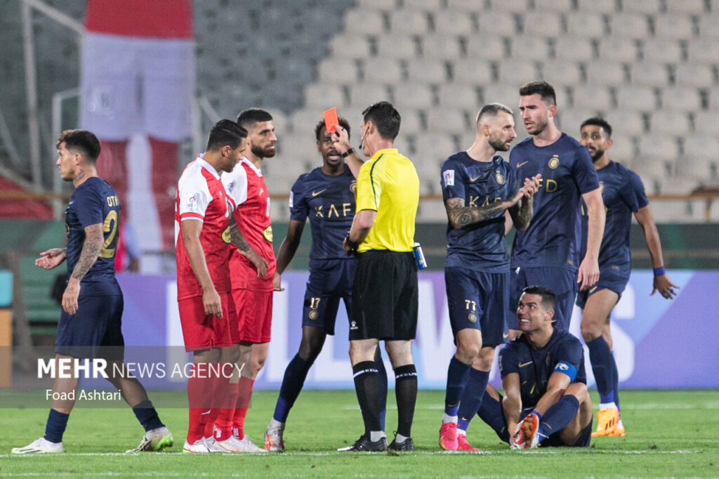 Ronaldo’s rash antics in Saudi Arabia- elbows rival and looms threateningly over referee