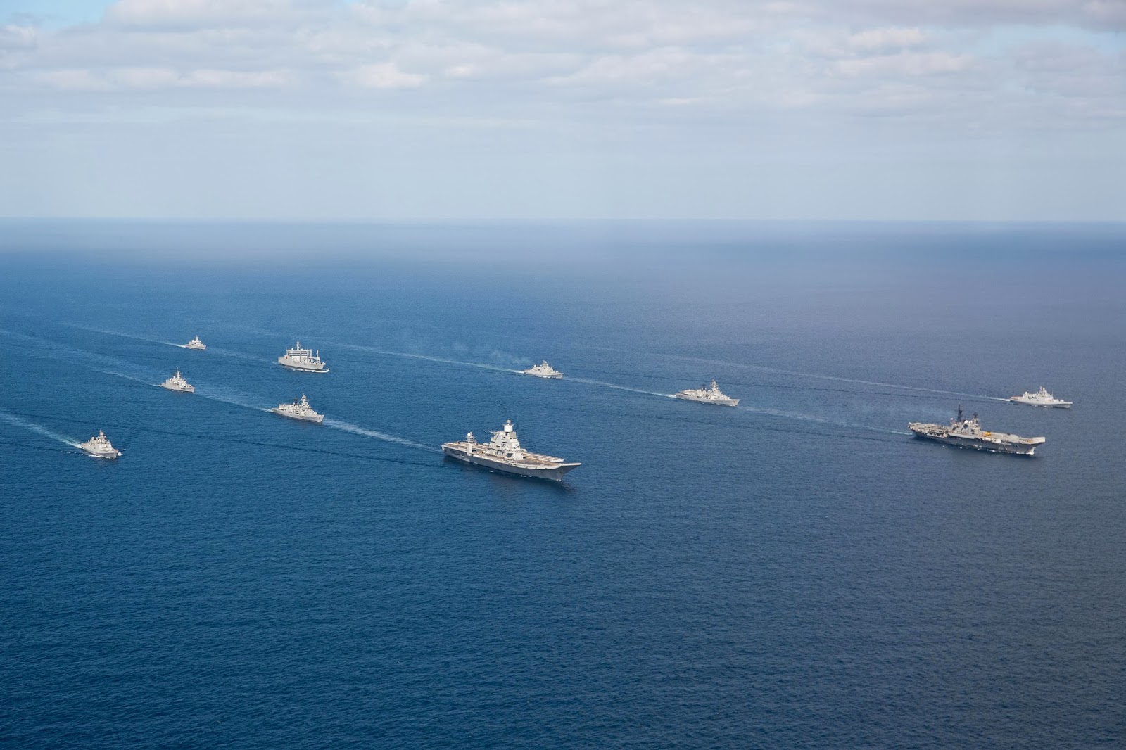 Indian Navy Western Fleet flotilla including aircraft carriers INS Vikramaditya and INS Viraat operates in the Arabian Sea, where India has deployed warships to escort oil tankers during the Iran war. Photo: Indian Navy / CC BY 2.5