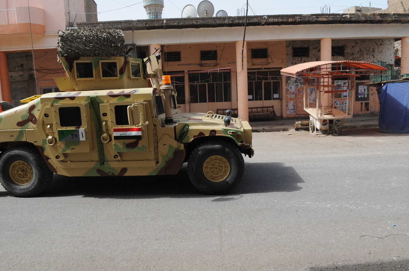 An Iraqi Army armoured Humvee patrols a Baghdad neighbourhood, reflecting the country fragile internal security situation as Iranian-backed militias challenge the central government authority. Photo: U.S. Department of Defense / Public Domain