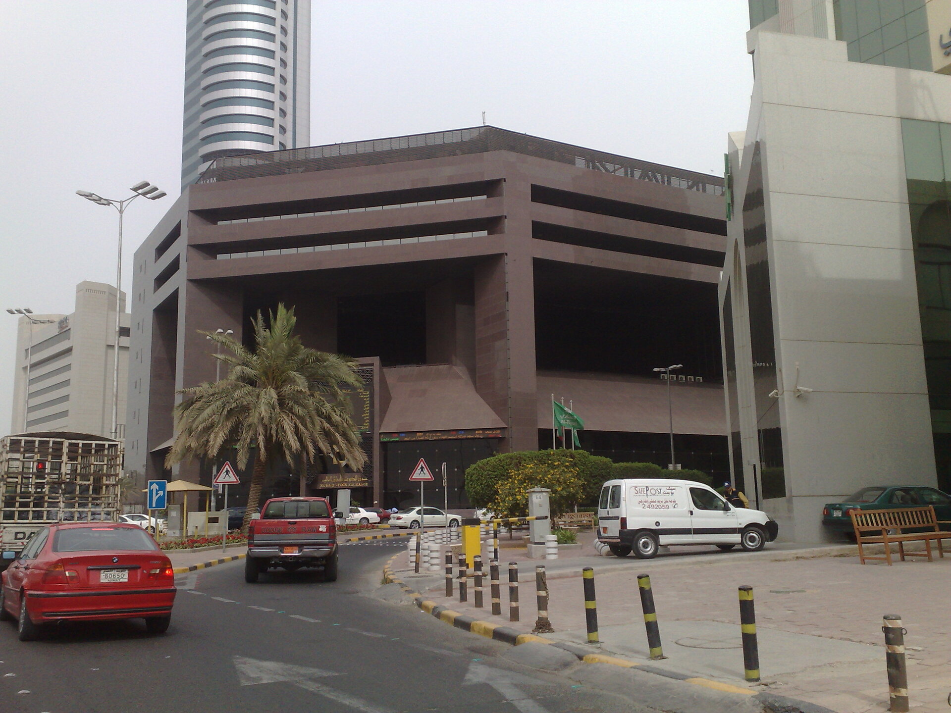 Kuwait Stock Exchange building in Kuwait City, one of the Gulf financial institutions facing severe disruption as Goldman Sachs projects a 14 percent GDP contraction for Kuwait during the Iran war