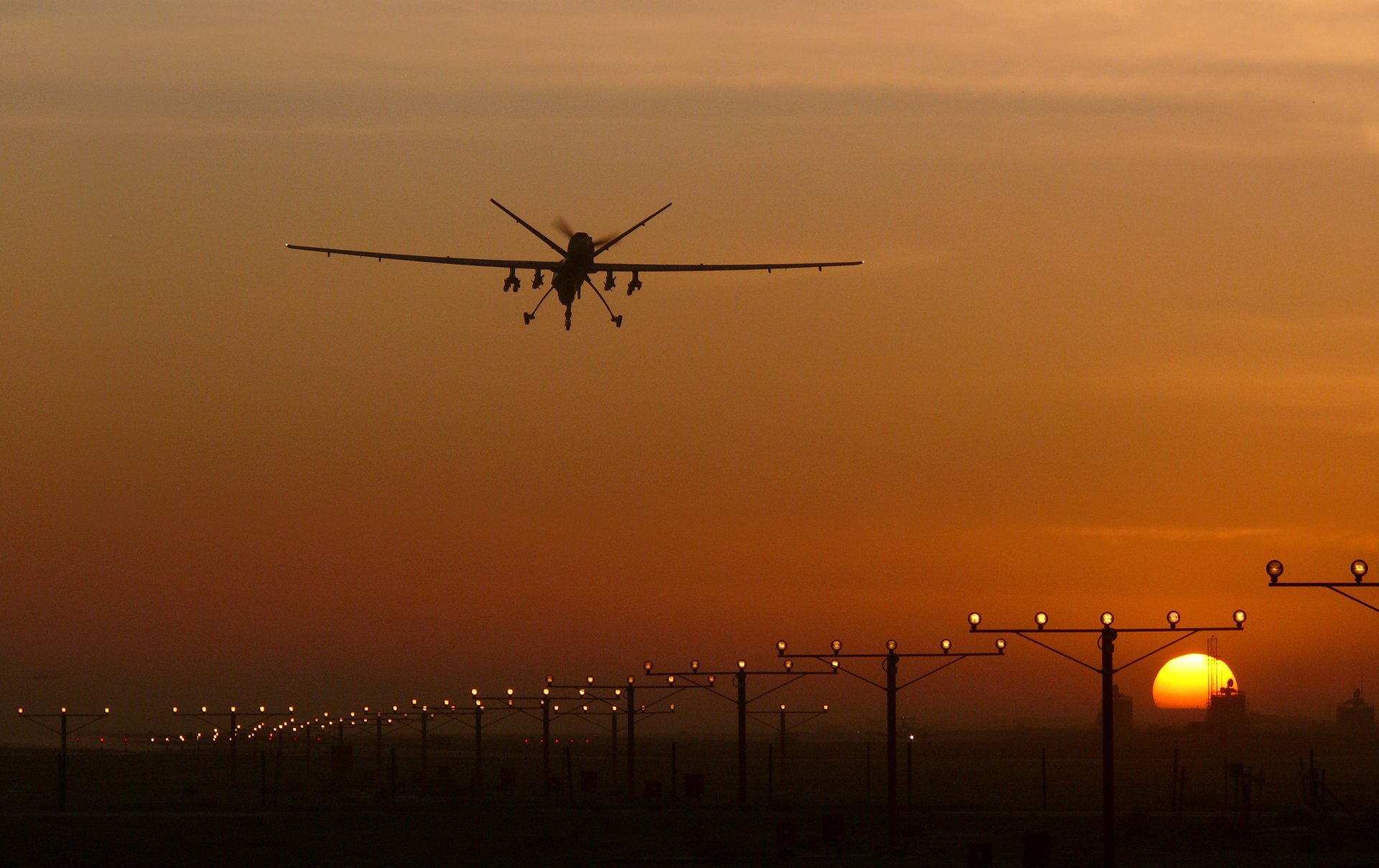 An MQ-9 Reaper drone lands at sunset. Unmanned systems and counter-drone technologies have become the fastest-growing segment of global defense procurement since the Iran war began. Photo: UK MOD / OGL v1.0
