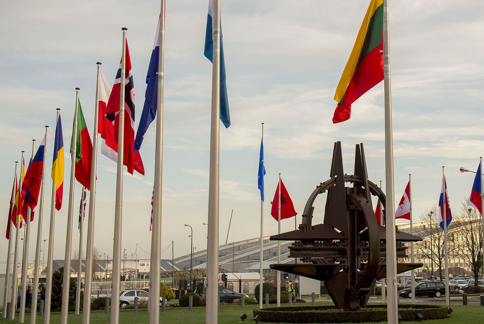 NATO member nation flags fly outside alliance headquarters in Brussels, Belgium. Photo: US Department of Defense / Public Domain