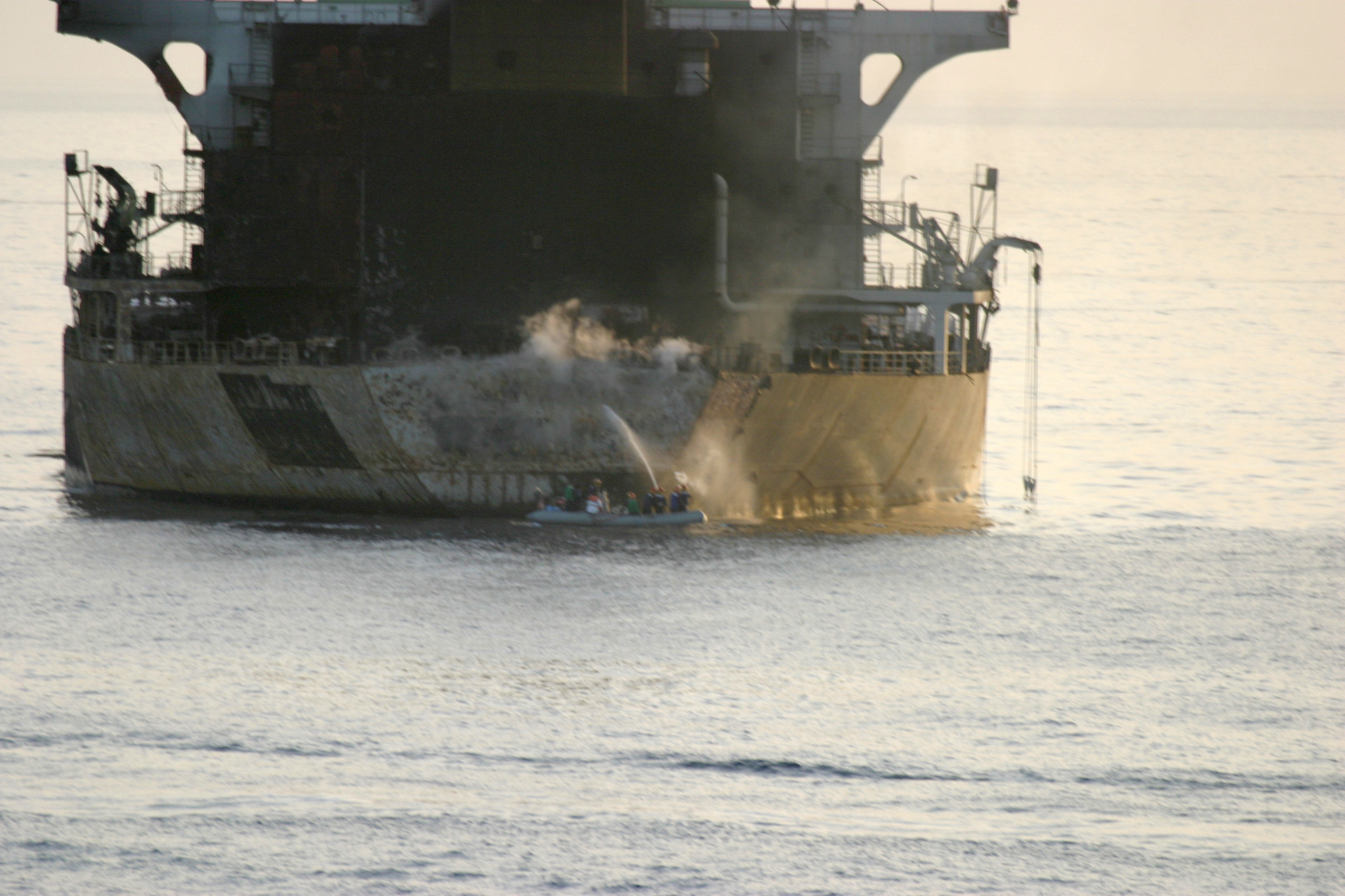 US Navy sailors fight a fire aboard motor vessel Everton off the coast of Oman, March 2004