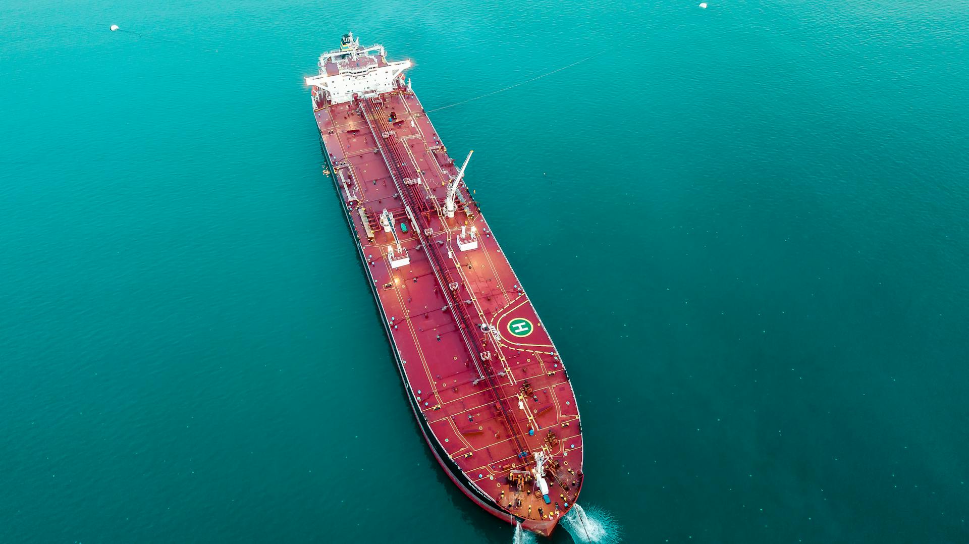 Aerial view of a large oil tanker at sea, the type of vessel vulnerable to Houthi anti-ship missile attacks in the Bab al-Mandab Strait