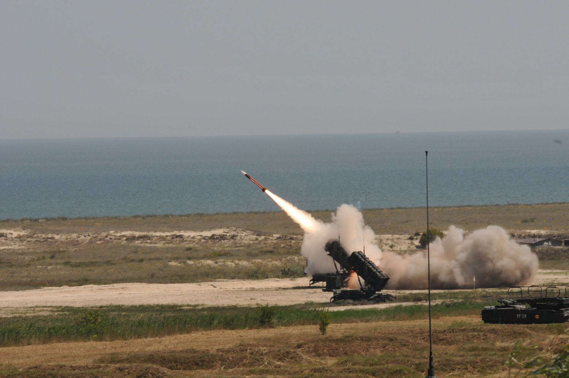 Patriot missile battery firing during live-fire exercise, the same air defense system Saudi Arabia relies on to intercept Iranian drone and missile strikes