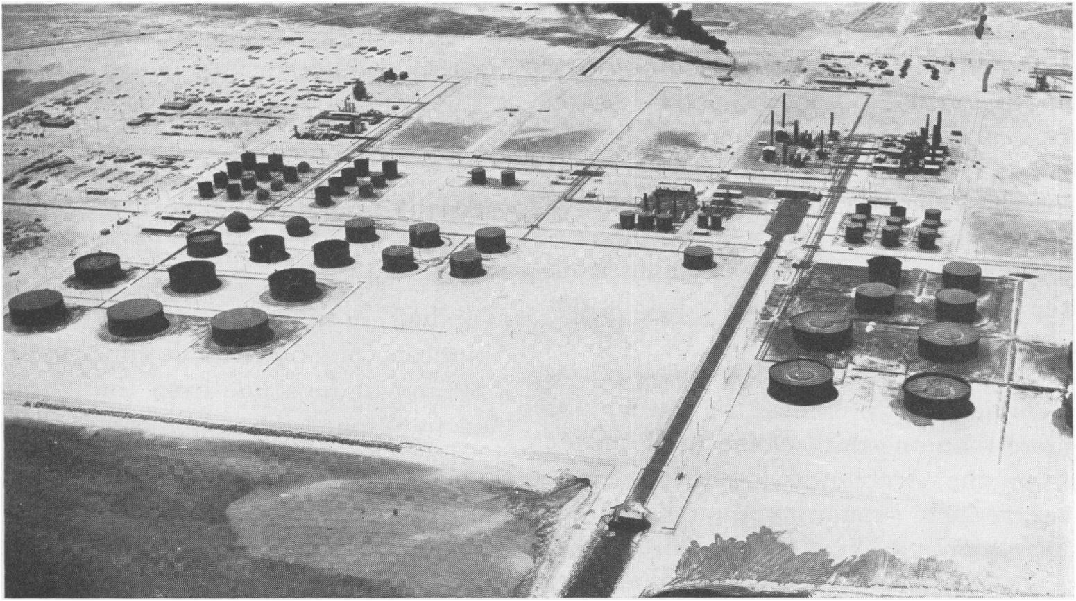 Aerial view of the Saudi Aramco Ras Tanura refinery and oil storage tank farm on the Persian Gulf coast