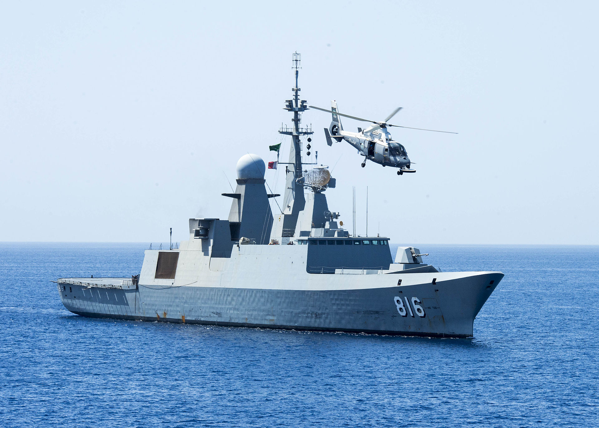 Royal Saudi Navy frigate Al Dammam (816) conducting operations at sea with a helicopter overhead, part of the Saudi naval fleet defending Persian Gulf and Red Sea waters. Photo: US Navy / Public Domain