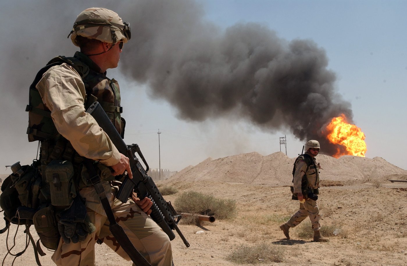 A burning oil well in the Rumaila oil fields of southern Iraq, home to the majority of Iraqi crude production. Photo: US Navy / Public Domain
