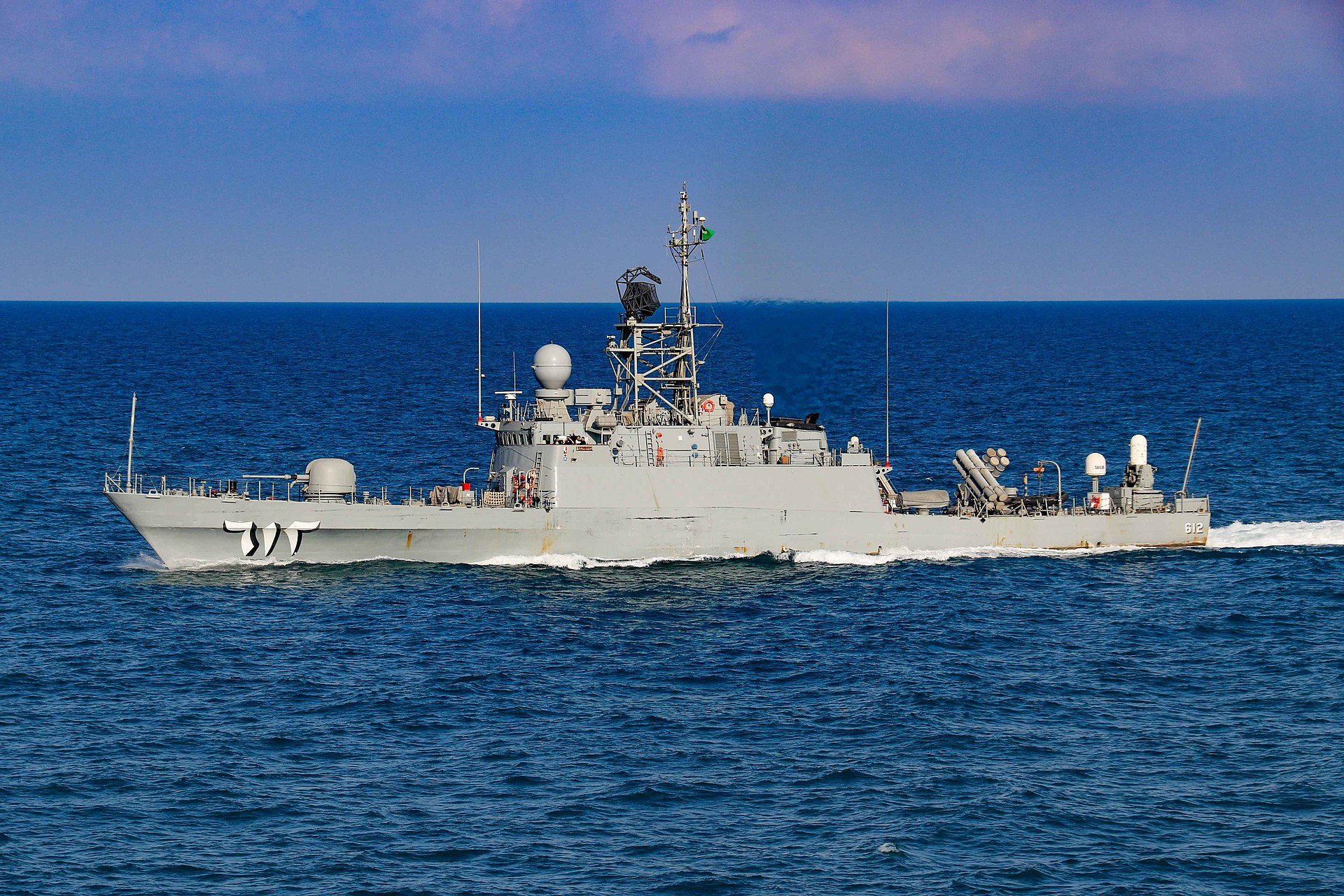 Royal Saudi Naval Forces corvette HMS Badr conducting precision maneuvers during joint Saudi-US exercises in the Arabian Gulf.
