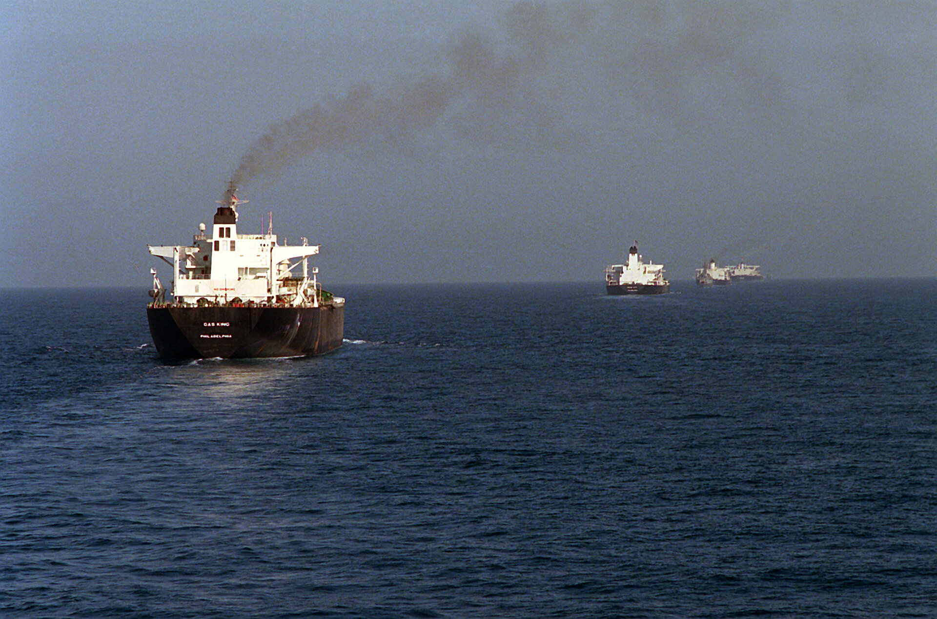 Oil tankers under military escort in convoy formation in the Persian Gulf during Operation Earnest Will
