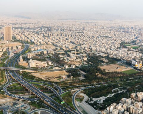 Aerial view of Tehran skyline from Milad Tower showing the sprawling Iranian capital under haze, as the country faces its worst economic crisis in modern history. Photo: Wikimedia Commons / CC BY-SA 4.0