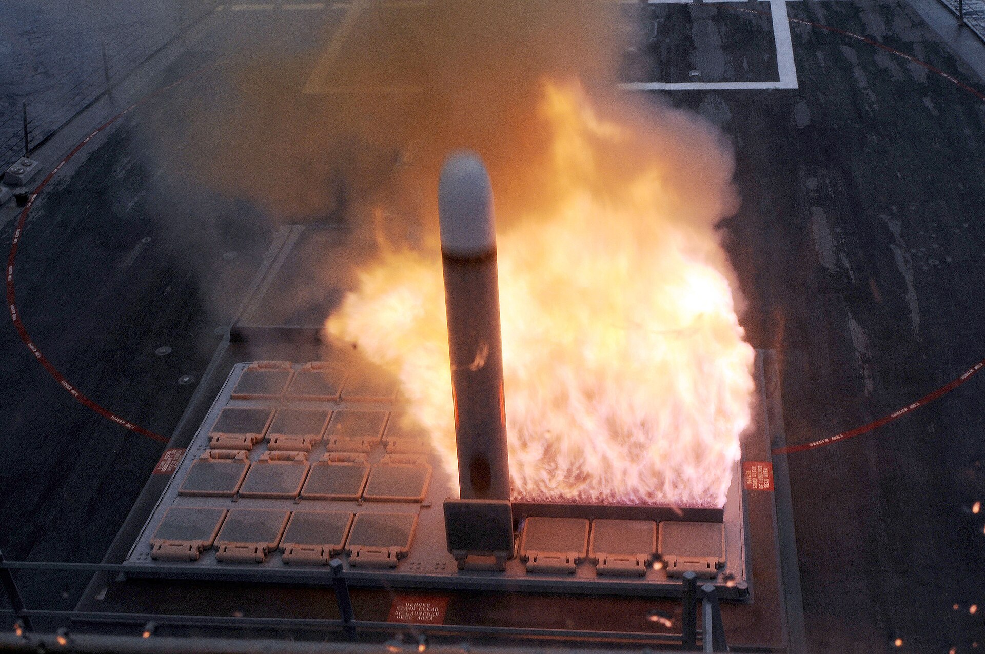 A Tomahawk cruise missile launches from the guided-missile destroyer USS Farragut, each missile costing approximately $2 million. Photo: US Navy / Public Domain