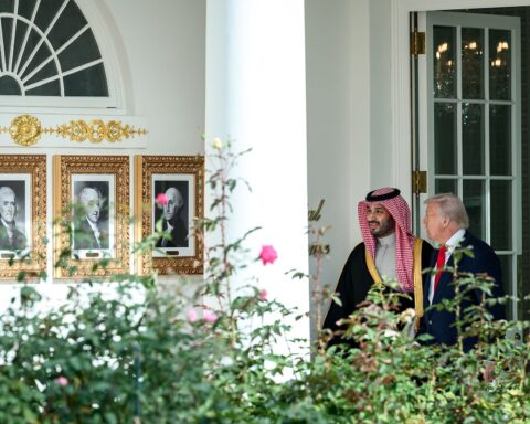 President Donald Trump and Crown Prince Mohammed bin Salman walk along the West Colonnade of the White House during a bilateral meeting in November 2025