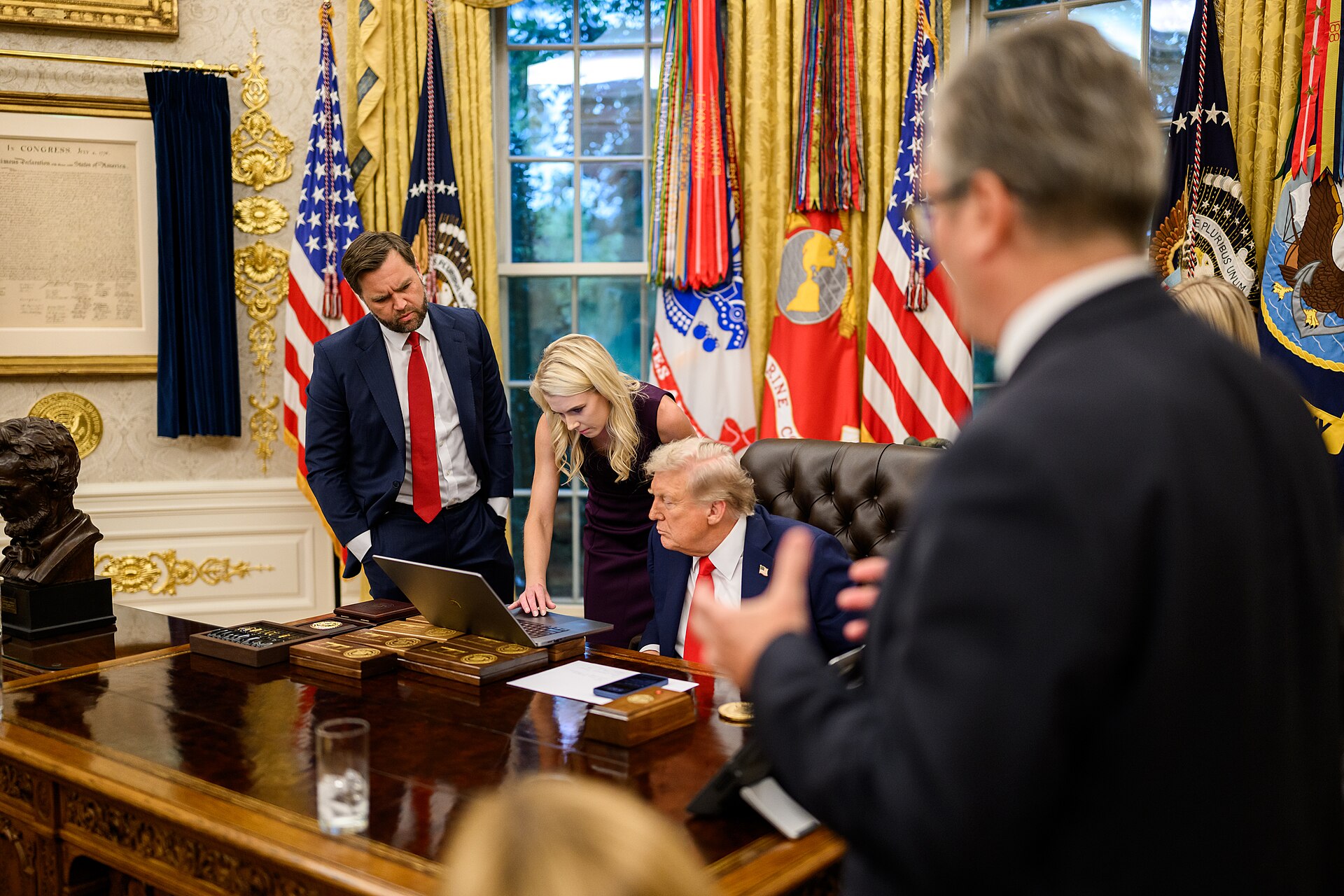 President Donald Trump drafts a Truth Social post in the Oval Office alongside Vice President JD Vance. Photo: White House / Public Domain