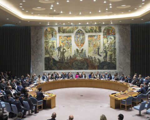 United Nations Security Council in session at the horseshoe table in New York, deliberating on a resolution to authorize military force to secure the Strait of Hormuz. Photo: UN / CC BY 2.0