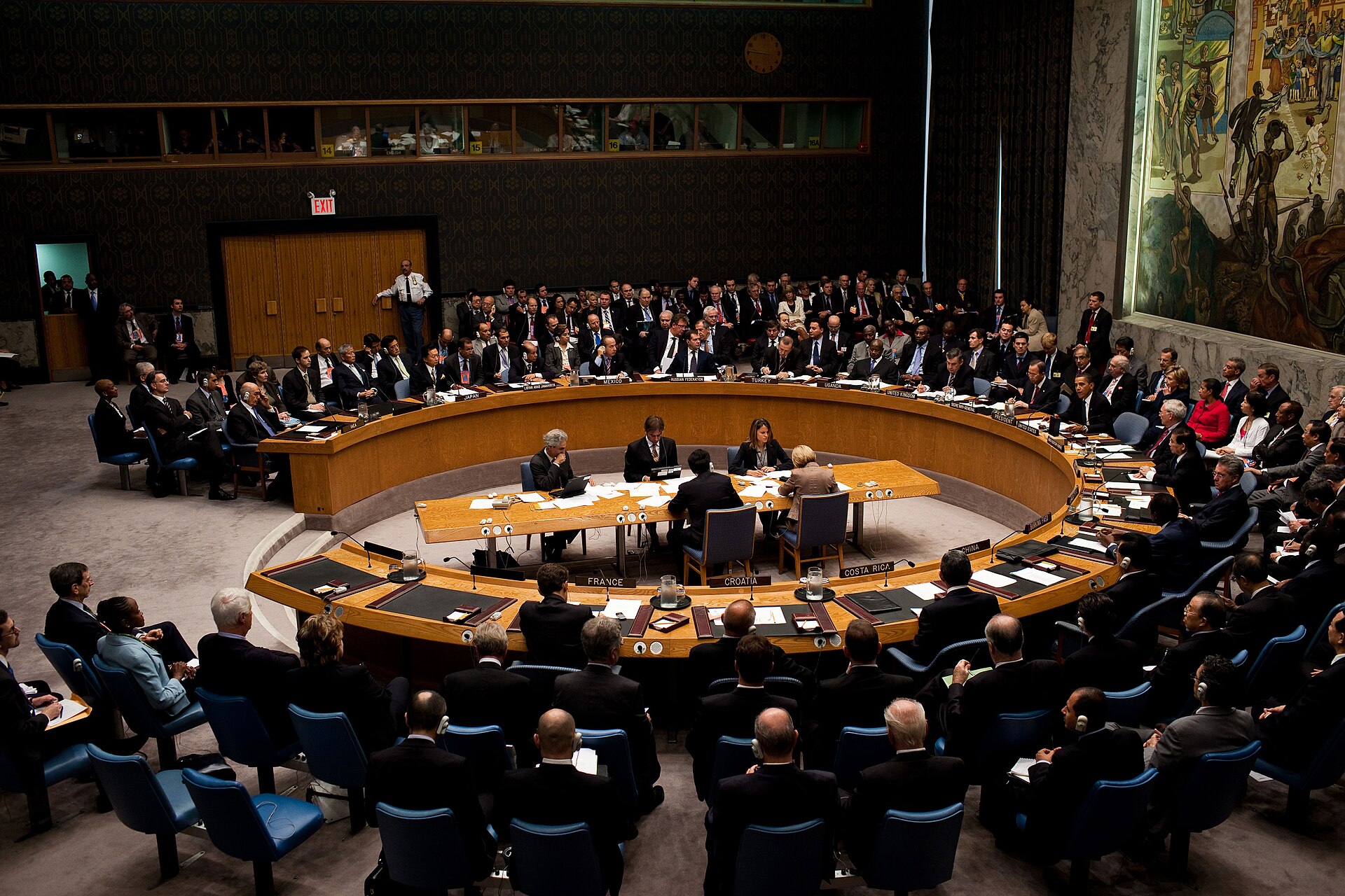 United Nations Security Council in session at UN Headquarters in New York, with delegates seated around the horseshoe table. Photo: White House / Public Domain