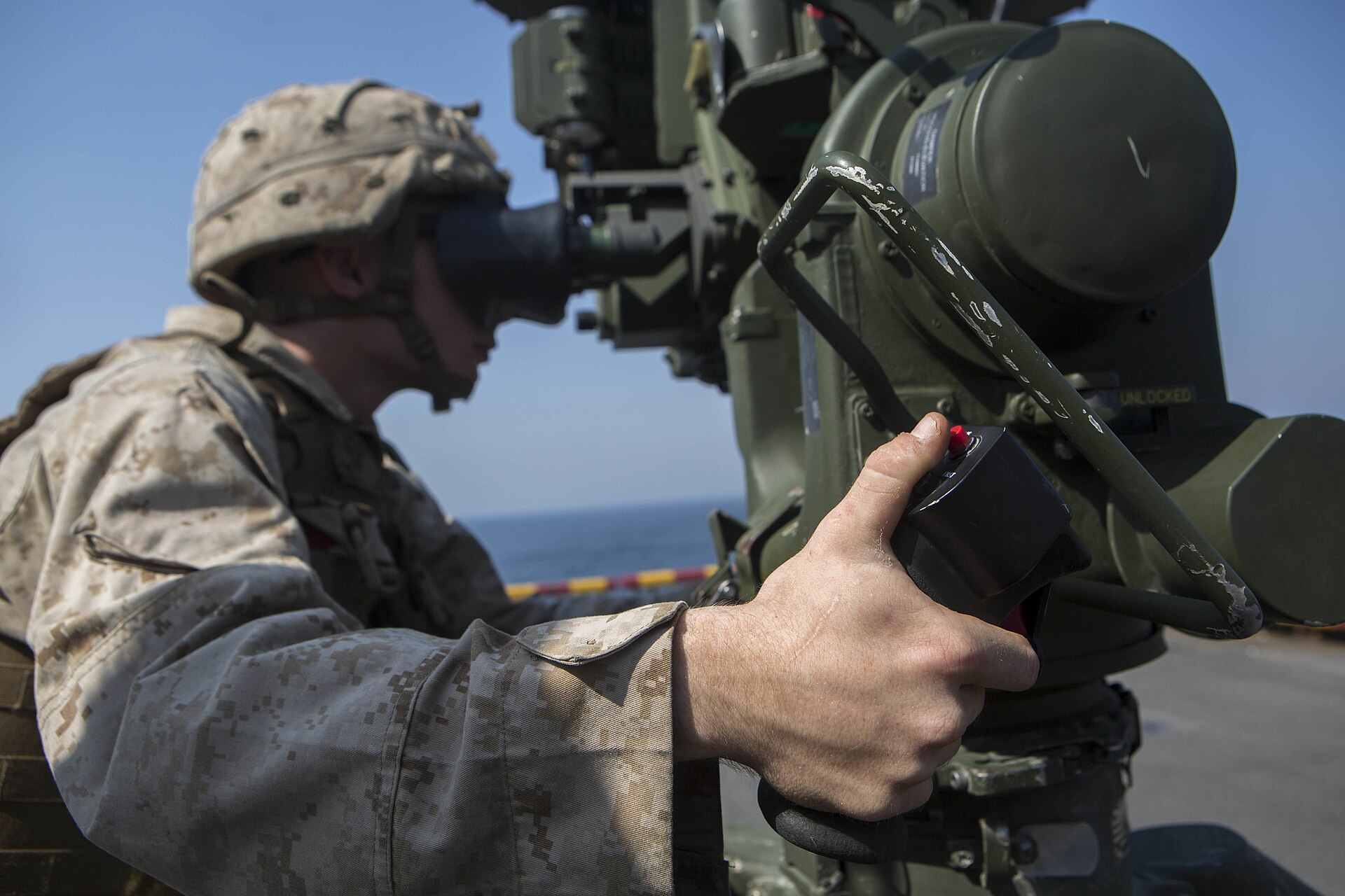 A US Marine monitors vessel traffic through the Strait of Hormuz using an anti-tank guided missile system aboard a Navy amphibious ship. Photo: US Marine Corps / Public Domain