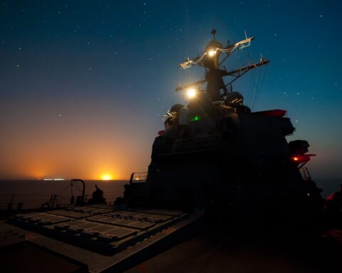US Navy guided-missile destroyer patrolling the Arabian Gulf at night during mine countermeasures operations. Photo: US Navy / Public Domain