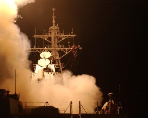 A US Navy destroyer launches Tomahawk cruise missiles during military operations, the type of strikes that devastated Iran military infrastructure in the 2026 war. Photo: US Navy / Public Domain