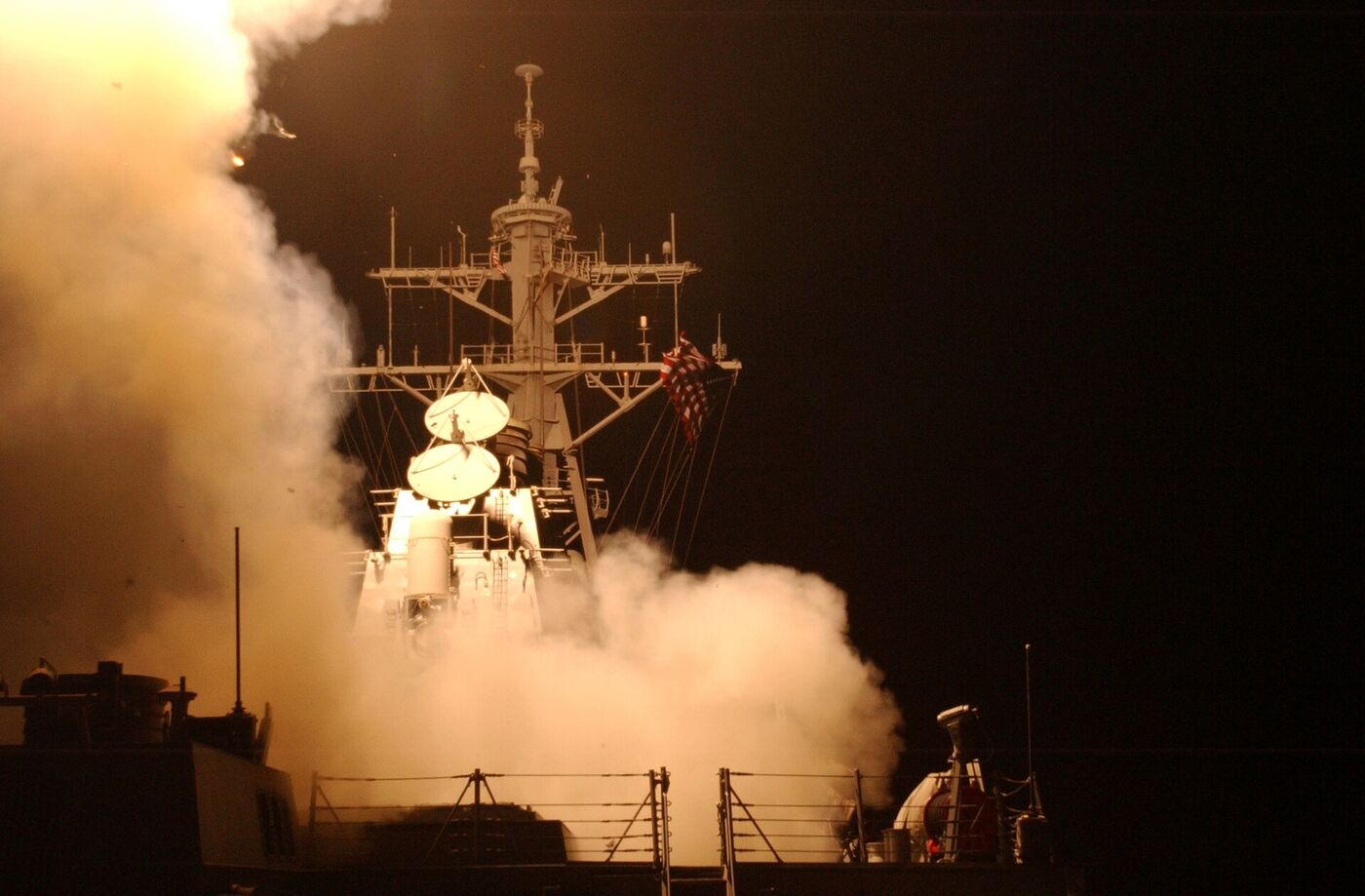 A US Navy destroyer launches Tomahawk cruise missiles during military operations, the type of strikes that devastated Iran military infrastructure in the 2026 war. Photo: US Navy / Public Domain