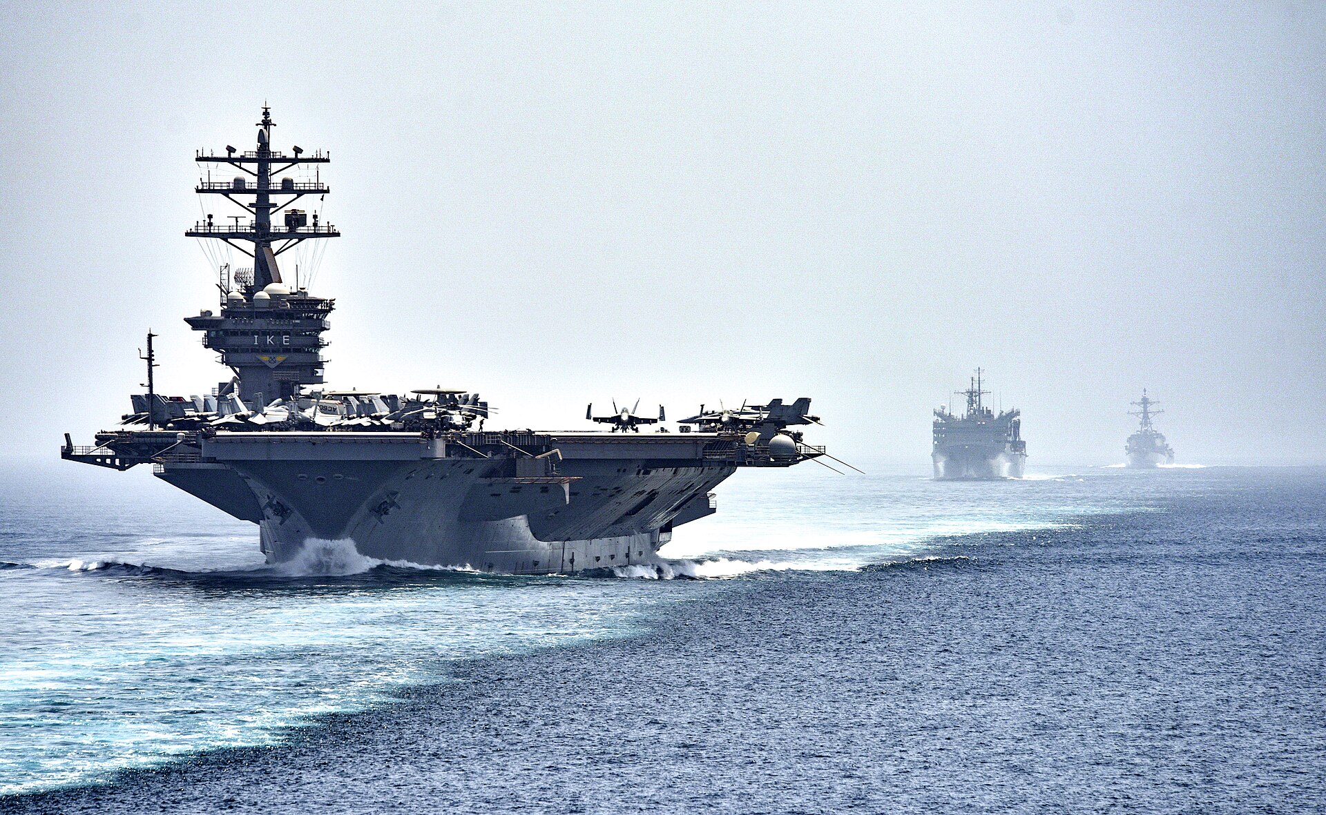 USS Dwight D. Eisenhower carrier strike group transiting the Strait of Hormuz with escort vessels. Photo: US Navy / Public Domain