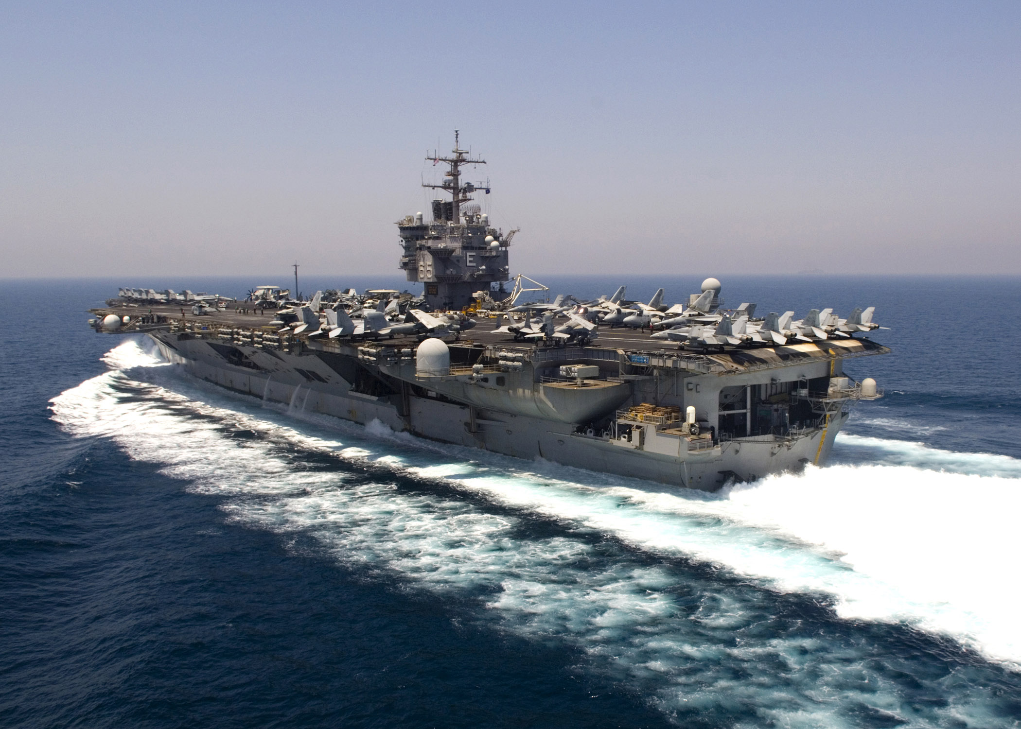 USS Enterprise aircraft carrier transiting the Persian Gulf, where US naval forces now defend the same oil shipping lanes King Faisal once weaponized. Photo: US Navy / Public Domain