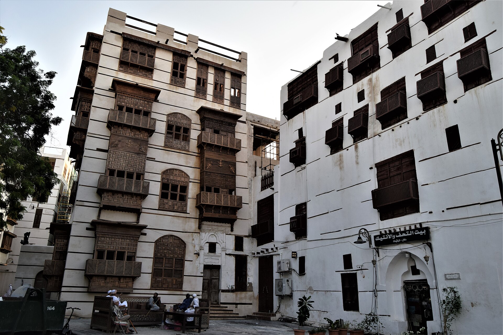 Historic coral-stone buildings with wooden rawasheen lattice windows in Al-Balad, Jeddah, Saudi Arabia
