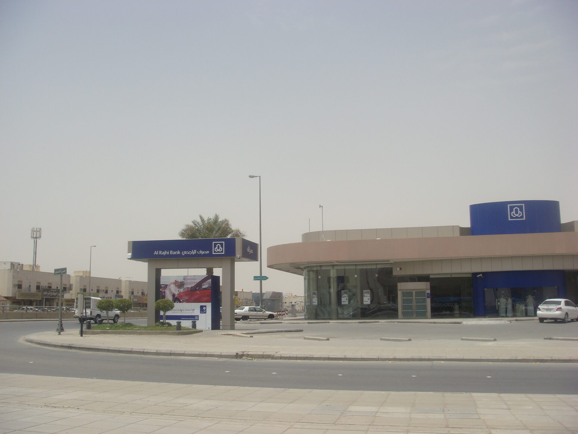 Al Rajhi Bank branch with ATMs in a typical Saudi Arabian city street