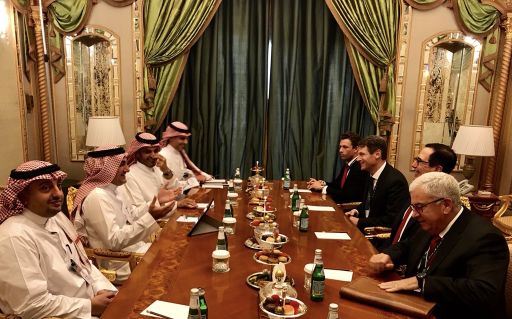 Saudi PIF Governor Yasir Al-Rumayyan meets US Treasury Secretary Steven Mnuchin at the Future Investment Initiative conference in Riyadh, 2019