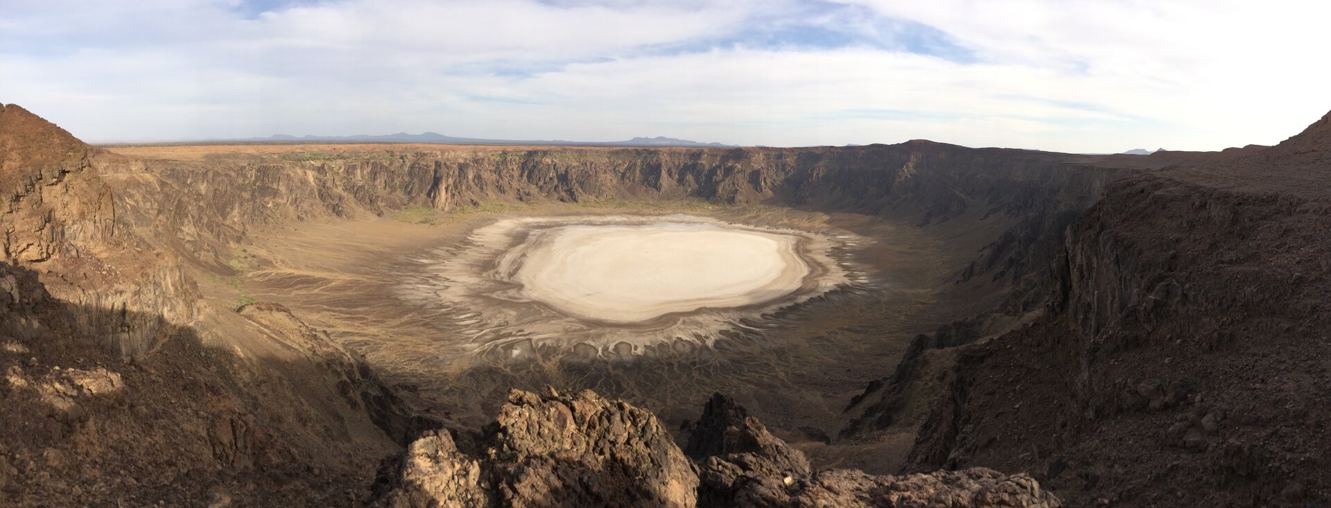 Panoramic view of Al Wahbah volcanic crater with its white sodium phosphate floor, Saudi Arabia