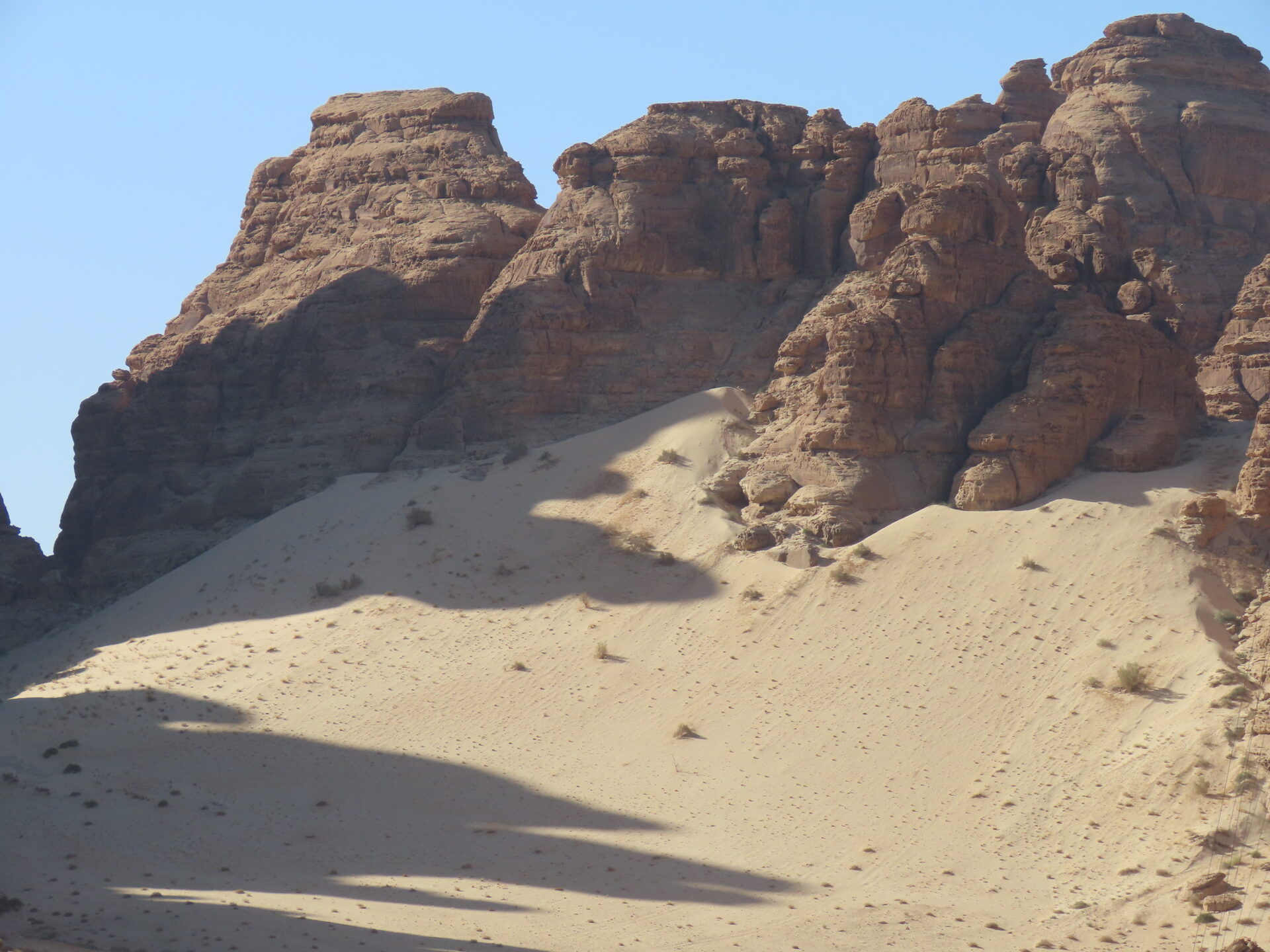 Sand dune and rock formations in AlUla, Saudi Arabia
