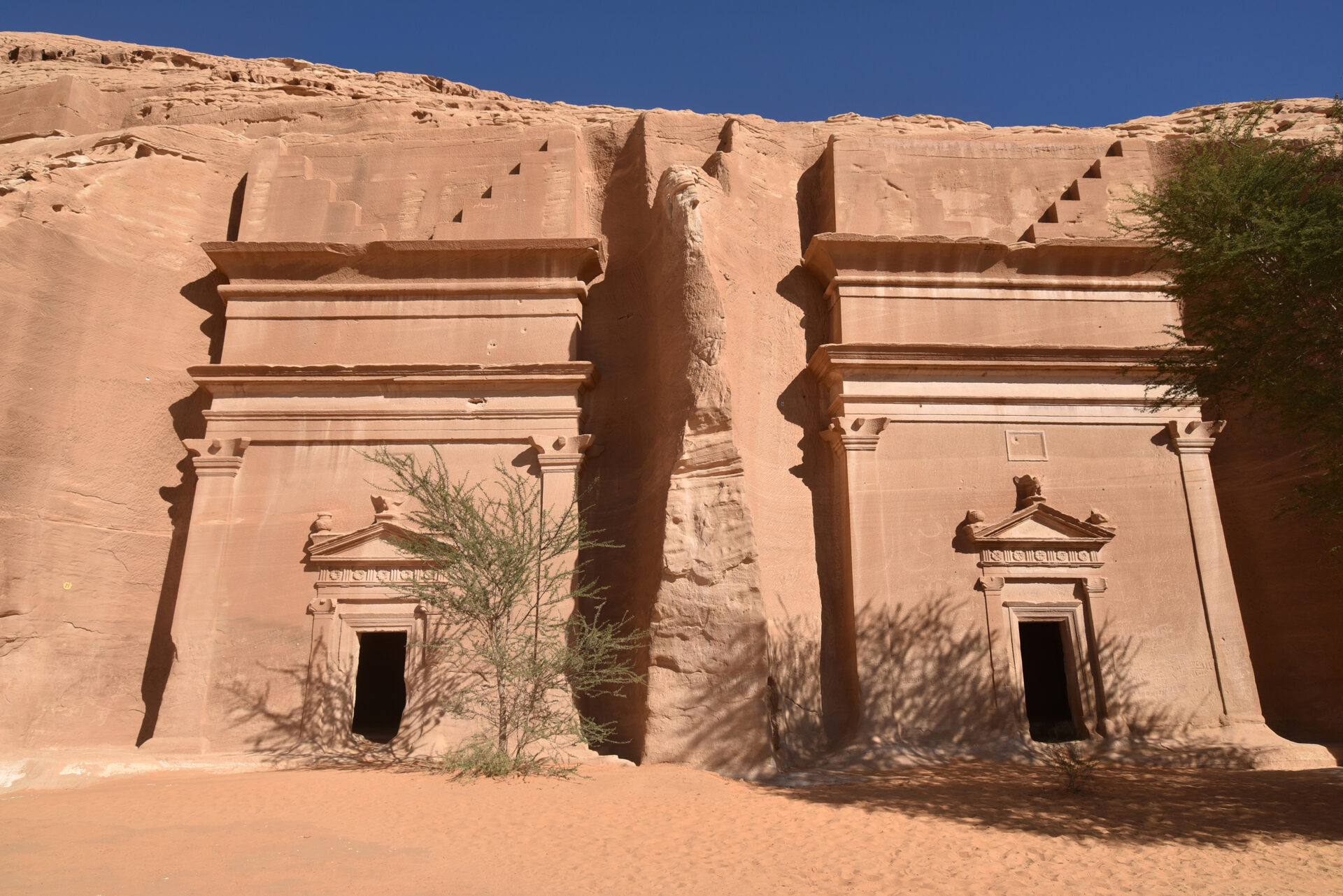 Qasr al-Bint necropolis tombs at Hegra, with carved Nabataean facades dating to the 1st century AD